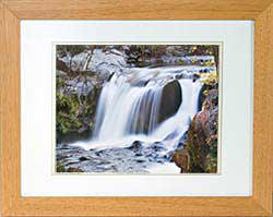 The Flowing Rogue River in light wood frame